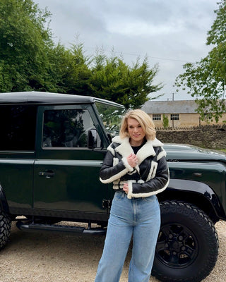 Women’s Black Cropped Sheepskin Jacket with White Shearling Trim, Belt & Zip Fastening – Luxury Cropped Shearling Coat