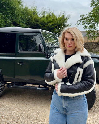 Women’s Black Cropped Sheepskin Jacket with White Shearling Trim, Belt & Zip Fastening – Luxury Cropped Shearling Coat